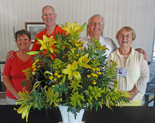 Nancy and Jay Mahanna, and Dorothy and Chuck Sheltona with 50th Reunion Bouquet
